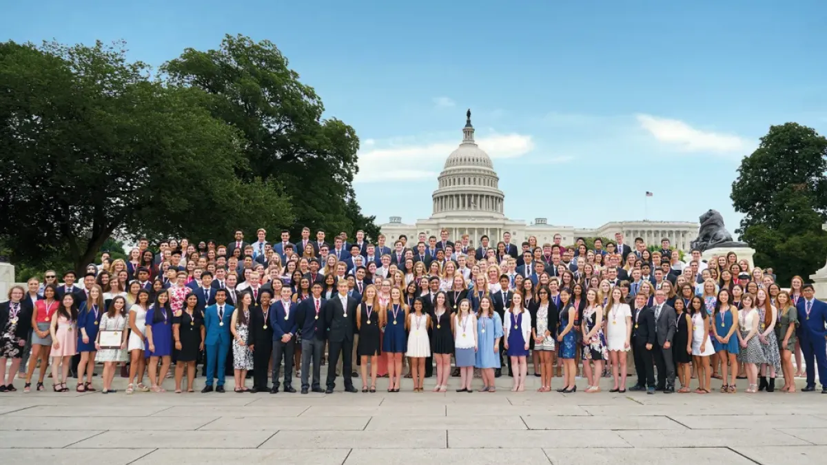 Congressional Award winners stand outside the U.S. Capitol 