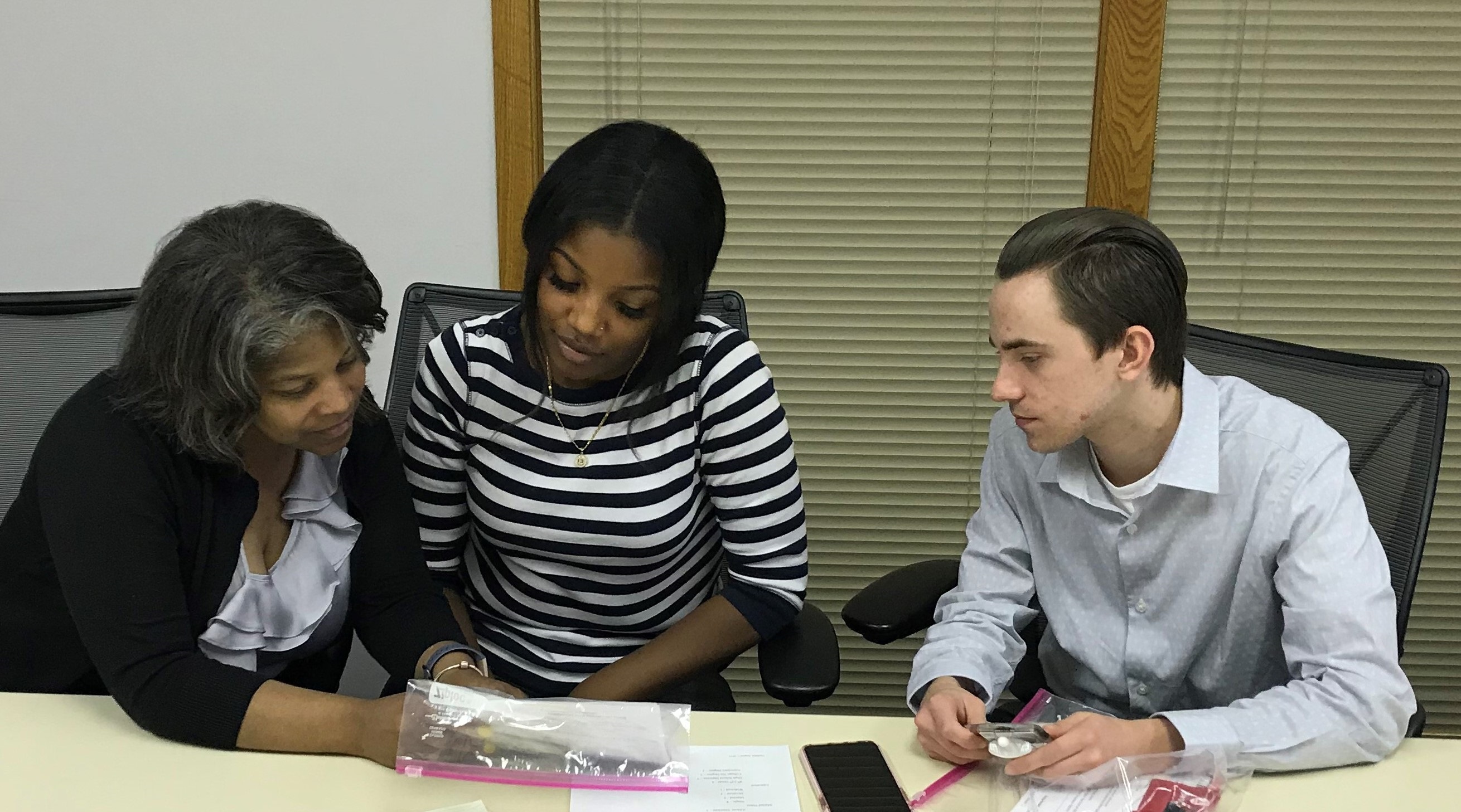 April Williams-Luster, Elise Miller and Kyle Bergfors