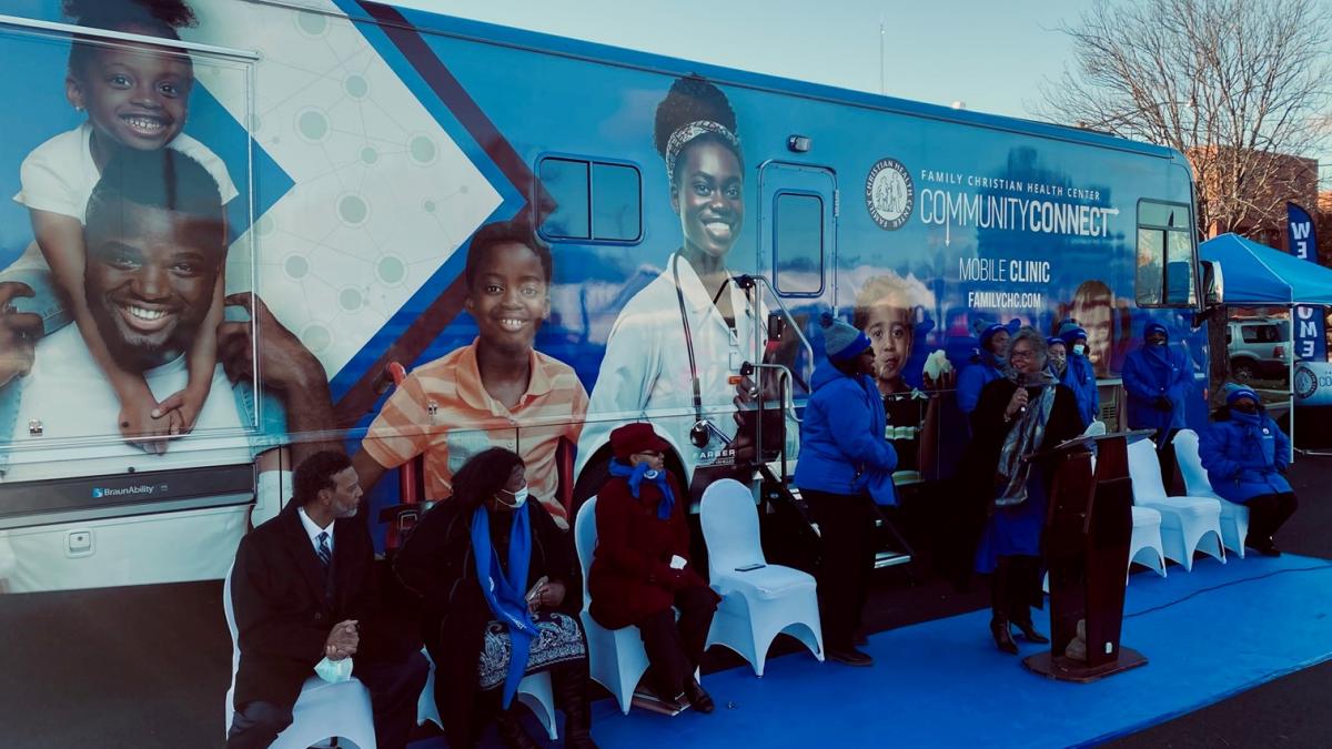 Rep. Kelly outside a healthcare bus 