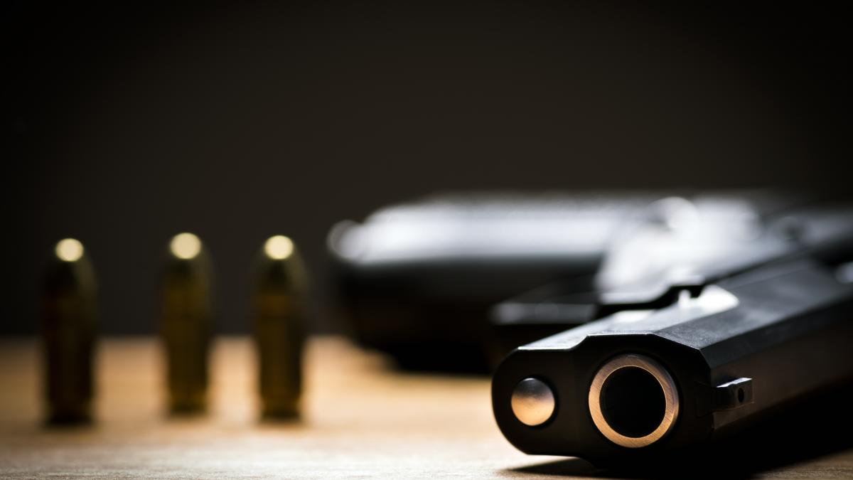 a gun on a table