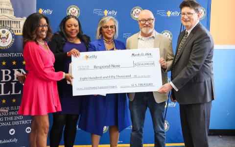 Rep. Kelly presents check 