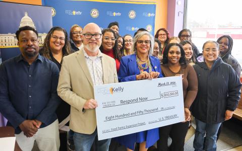 Rep. Kelly presents check to Respond Now staff 